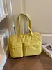 Nuevo modelo transfronterizo para otoño e invierno 2026, bolso de mano de gran capacidad, estilo coreano, color sólido, ligero, simple, casual, bolso de hombro versátil