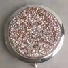 Espejo plegable de doble cara de diamante de alta calidad, espejo cosmético portátil de metal cristalino con logotipo redondo, espejo de regalo