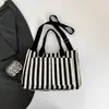 Bolso de mujer transfronterizo de gran capacidad, nueva colección otoño 2026, bolso de hombro versátil y a la moda, bolso tote moderno y casual para el trabajo y el uso diario