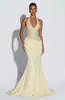 Vestido longo de noite estilo europeu e americano para 2026, com gola halter, decote em V profundo, lantejoulas, cintura marcada plissada de luxo leve, bodycon, com cauda