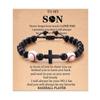 Pulsera de cuentas de fútbol con cruz estilo deportivo, pulsera ajustable tejida a mano con cuentas de piedra negra y balón, con cartón