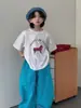 Camiseta Meninos Queijo e Gato Verão 2026 Nova Estampa Carrossel Infantil Manga Curta Estilo Coreano Casual Camisa Básica Tendência