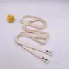 Suministro directo de fábrica cuerda plana hueca para sombrero suéter pantalones cuerda de algodón tejida pantalones de cuerda de algodón cuerda para sombrero 1.2 cm cinturón de cuerda de algodón bordado