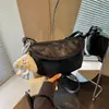 Bolso de axila de nicho estilo coreano transfronterizo, nuevo modelo de moda versátil para el otoño de 2026, bolso de mano para el día a día, bolso de hombro y cruzado