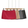 8696-26 Verão Estilo Coreano Cintura Baixa Cor Vibrante Liso Saia de Conjunto Curta Evasê com Short de Segurança