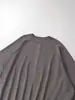 Comercio exterior transfronterizo de Amazon 2026 artículo de venta caliente chaqueta cárdigan suelta de punto con mangas de murciélago y cuello redondo con cremallera para mujer color gris oscuro