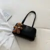 Bolsa de bowling esmerilada minimalista de nicho al por mayor transfronteriza 2026 nuevo bolso de gamuza bolso Boston bolso de mano bolso cruzado grande