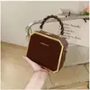 Bolsos de Mujer Populares de Alta Gama y Elegantes, Nuevo Nicho de Moda Coreana, Bolsos Versátiles de Temperamento de Alta Gama para Llevar en la Mano y Cruzados