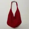 Bolsa de Ombro de Tricô para Mulheres 2025 Novo Estilo Bolsa de Praia Vazada Tecida Bolsa Tote de Grande Capacidade Bolsa Versátil Diária Tendência