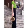 9555 Da Ai Mei Yuan 2025 Verano Nueva Moda Top Verde de Manga Corta Pantalones Rectos Casuales de Cintura Alta Ropa para Mujer