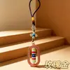 Joia de liga metálica estilo étnico chinês, pingente decorativo de vajra oval giratório, lembrança de viagem atacado