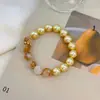 Pulsera de Piedra Ojo de Gato de Cristal Natural Color Rosa Manta, Sensación de Lujo Ligero y Gama Alta, Pulsera Versátil, Accesorio Redondo Perfecto para Apilar
