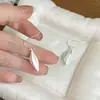 Nuevos aretes colgantes de plata cepillada estilo chino para mujer, de alta gama, únicos y deslumbrantes ganchos para la oreja, adecuados para caras cuadradas y redondas, aretes de moda y elegantes