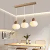 Lámpara de araña de estilo japonés vintage para restaurante, lámpara de mesa de comedor triple simple de nogal, lámpara de araña pequeña y silenciosa de estilo antiguo.