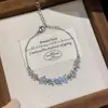 Pulseira Oca com Flor de Zircônia e Laço Estilo Coreano Ins, Pulseira de Pulso de Luxo Leve de Nicho de Alta Qualidade, Acessório de Mão Doce e Único
