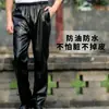Pantalones de cuero aceitado overol de cuero para hombre a prueba de viento matadero japonés anti-suelto a prueba de salpicaduras de cuero todo partido Hong Kong otoño e invierno