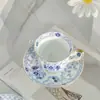 Juego de Regalo de Taza y Platillo para Café de Porcelana de Hueso Azul y Blanco de Alta Gama Estilo Japonés Venta al por Mayor Taza y Platillo de Lujo Ligero Vintage para la Tarde