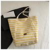 Bolso de mano informal de lona a rayas de doble cara, estilo perezoso, de gran capacidad, 2025