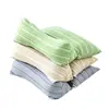 Travesseiro cervical triangular personalizado para uso doméstico, travesseiro de artemísia para tração do sono e suporte cervical, travesseiro de trigo sarraceno, atacado do fabricante
