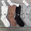 Miumiu calcetines de moda para mujer otoño e invierno calcetines de caña media letras bordadas calcetines de hada punto doble