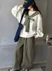 Conjunto de otoño para niña 2026 nuevo estilo: elegante chal, sudadera con capucha y pantalones casuales de pierna ancha, un conjunto de dos piezas para niñas mayores