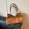Bolsa Tote Fosca de Luxo para Mulheres 2025 Outono Nova Estampa de Leopardo Retrô Grande Capacidade Acessível Luxo Casual Bolsa de Ombro