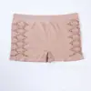 Amazon Transfronterizo Calzoncillos tipo bóxer lisos de color sólido con diseño geométrico hueco Ropa interior cómoda de cintura media para mujer estilo europeo y americano Venta al por mayor