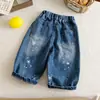 Calça Longa Infantil 2026 Outono Novidades Meninos e Meninas Patchwork Solta Jeans Estampado Bebê Estilo Coreano Calça Estrela