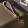 Pulseira de corda curta para pulso com broca lateral criativa com broca corda de celular joia com broca completa cor cordão para pendurar no pescoço corda anti-queda pingente