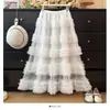 Falda de malla adelgazante de cintura alta AliExpress cintura elástica longitud media hasta la rodilla multicapa con volantes falda tipo pastel súper de hadas