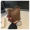 Bolso de Cubo Retro de Cuero Suave Transfronterizo para Mujer Nuevo Estilo 2026 Bolso de Hombro Simple y a la Moda Bolso Cruzado para el Viaje Diario