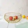 Cesta de frutas de hierro de lujo ligero transfronteriza, bandeja de frutas de metal hueca creativa para sala de estar de casa, mesa de centro, cesta de almacenamiento de bocadillos
