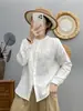 Estilo artístico y fresco, bolsillo grande, cuello alto, corte holgado, gasa de algodón de doble capa, hombro normal, camisa de manga larga color blanco algodón para bebé para mujer