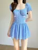 Traje de baño a cuadros azules de nuevo estilo 2026 para mujer, de alta gama, estilo coreano, adelgazante, que cubre el abdomen, de una pieza, para estudiante, vacaciones en la playa
