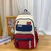 Mochila casual leve de grande capacidade 2026 estilo coreano ins alto valor estilo universitário mochila color block