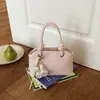 Bolsa de mão moderna transfronteiriça para mulheres, novo modelo 2026, bolsa de ombro versátil simples e estilosa, bolsa transversal para o dia a dia versão coreana