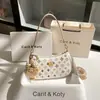 Diseño de nicho para dropshipping bolso de hombro con bloques de color modelo nuevo 2026 bolso de cadena de alta gama para axila venta al por mayor