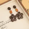 Nuevos aretes de madera estilo chino con forma de gota de agua para mujer, aretes de estilo étnico vintage para rostros cuadrados y redondos, aretes bohemios para vacaciones