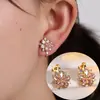 Gran Venta Clips para Orejas de Circonita Cúbica Flor de Cerezo Pendientes de Flor de Cinco Pétalos Dulces y Elegantes Franceses Diseño Creativo de Nicho Accesorios para Pendientes de Alta Gama