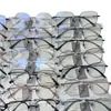 Gafas Retro sin Montura Semi-Titanio Pure Desire para Miopía para Mujer Montura Grande Doradas sin Montura Venta al por Mayor