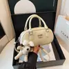 Bolsa de Bowling Portátil com Design de Nicho 2026 Nova Bolsa de Trabalho para o Dia a Dia Feminina Sensação de Alto Padrão Bolsa Transversal de Luxo Leve