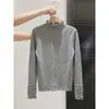 Camiseta básica de punto gris de cuello medio alto para mujer, nuevo top ajustado de manga larga para otoño e invierno con bordes de volantes estilo francés