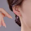 Brincos de Tarraxa de Prata S925 Vazados com Diamante Inlaid de Cabaça para Mulheres, Luxo Leve Banhado a Ouro K Popular Exquisito Joias de Prata Atacado