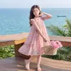 Vestido de Verão para Meninas 2026 Novo Estiloso Vestido Infantil para Meninas Mais Velhas Doce Vestido Floral com Laço de Verão
