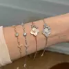 Conjunto de Pulsera y Collar de Plata de Ley 925 Más Vendido Transfronterizo, Lujo Ligero, Artesanía Exquisita, Conjunto Único de Pulsera de Trébol de Cuatro Hojas y Lazo para Mezclar y Combinar