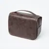 2025 Nova Bolsa de Higiene Pessoal Masculina em Couro PU Mais Vendida Portátil de Viagem Bolsa de Armazenamento para Artigos de Barbear