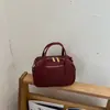 Bolsa de bolos tejida transfronteriza, diseño de nicho de lujo ligero, bolso de hombro y cruzado, bolso Boston tipo almohada de moda