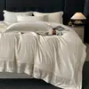 Lujoso y elegante juego de cama de cuatro piezas de algodón de grado A, con un diseño europeo sencillo, colores lisos y adecuado para hoteles.