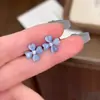 2025 Nuevos Aretes de Flor Azul Explosiones para Mujer Diseño Nicho Simple Combinación Universal Aretes Exquisitos de Primavera y Verano