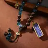 Pingente de Thangka Estilo Xizang da Divindade da Riqueza Negra com Contas de 108 e Material de Madeira de Seis Vias Pingente Estilo Xizang para Segurar na Mão